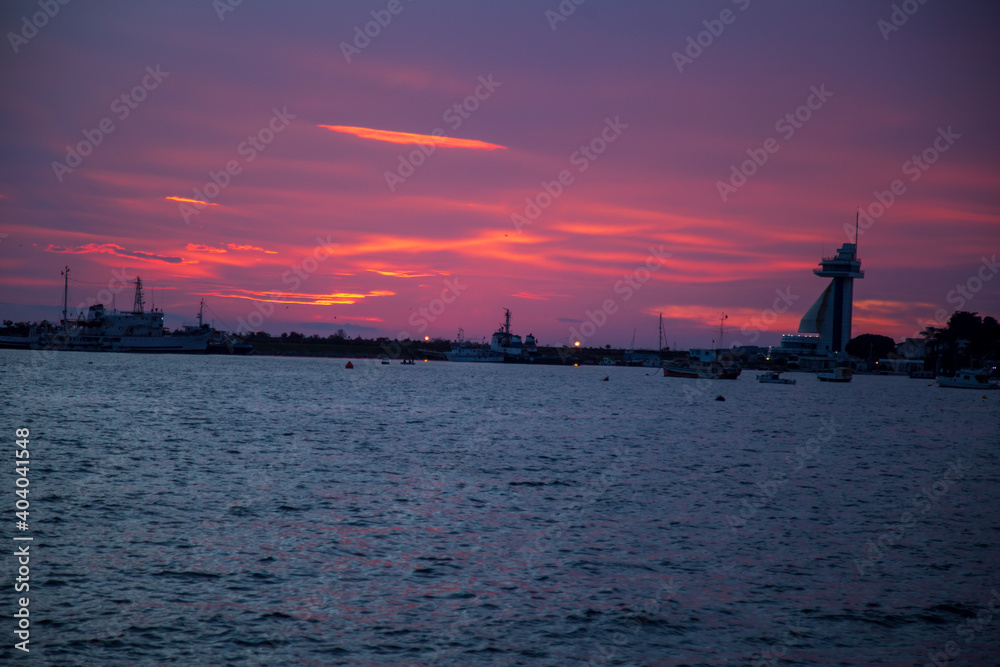 amazing sunset view colorful sky. boats and seagulls ready to sail