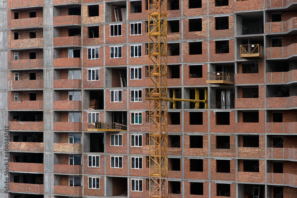Installation of window frames during construction. Energy saving. Production of apartments, social housing.
