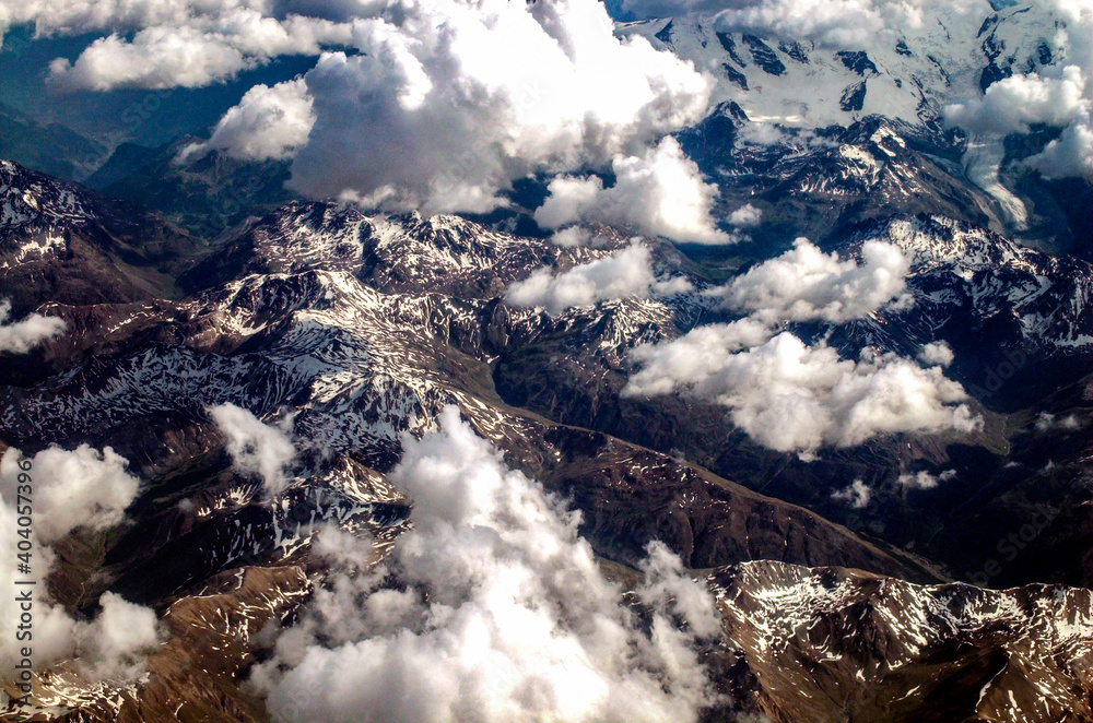 Aerial view of clouds above mountains
