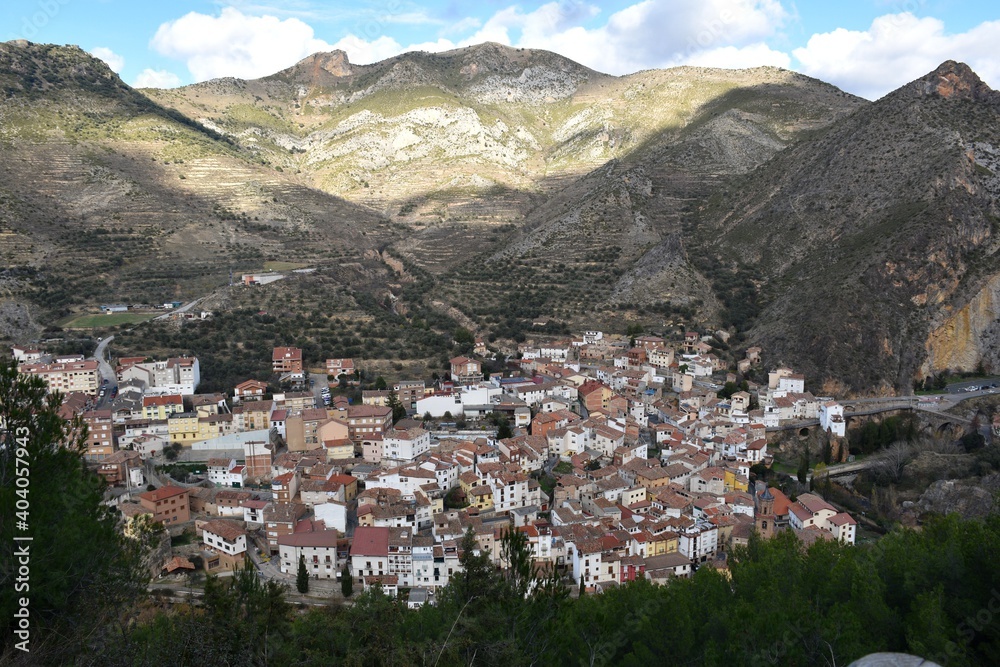 View of the village of Arnedillo from the mountain. Arnedillo village, cloudy and clear day.