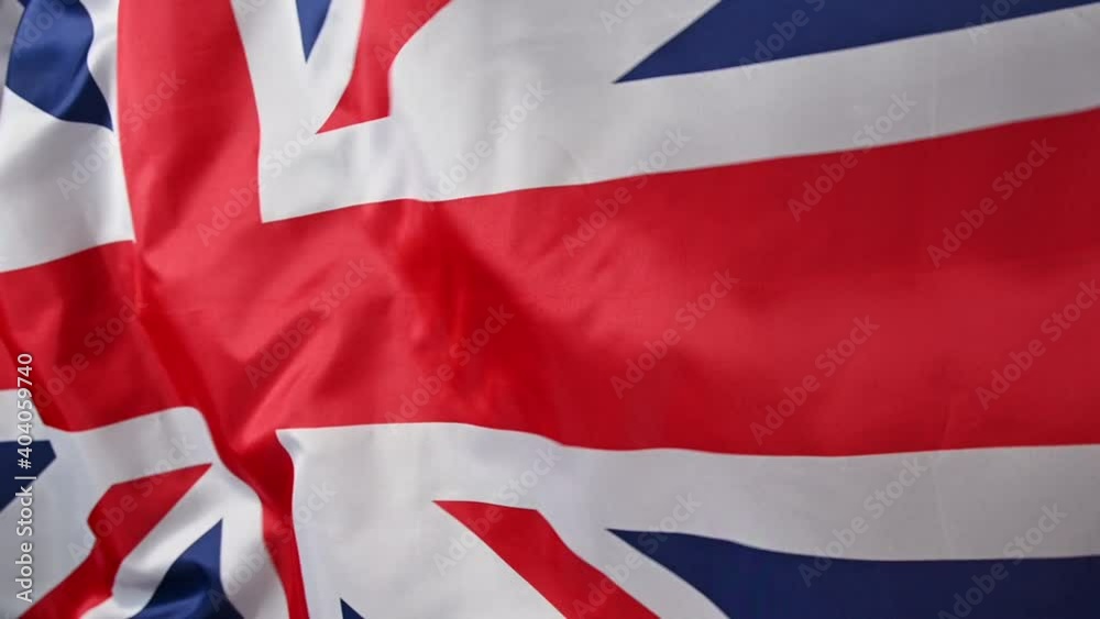 Background of UK flag waving in the wind Background of UK flag waving in the wind