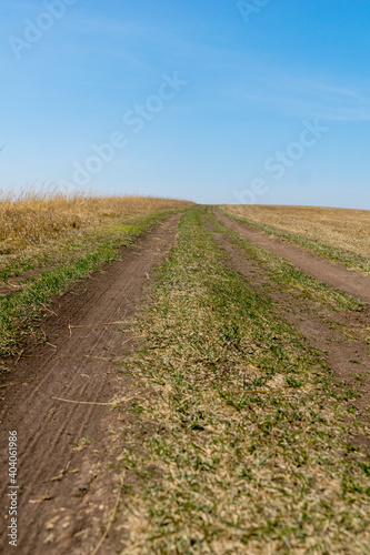 A road in a rural area. Road to the sky