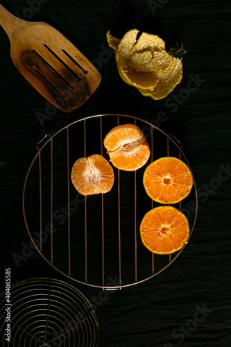 Healthy and fresh colorful oranges pealed off on the table