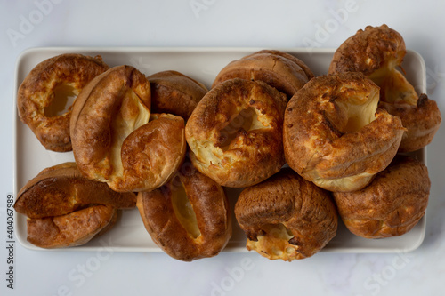 Yorkshire Puddings top view on a white tray