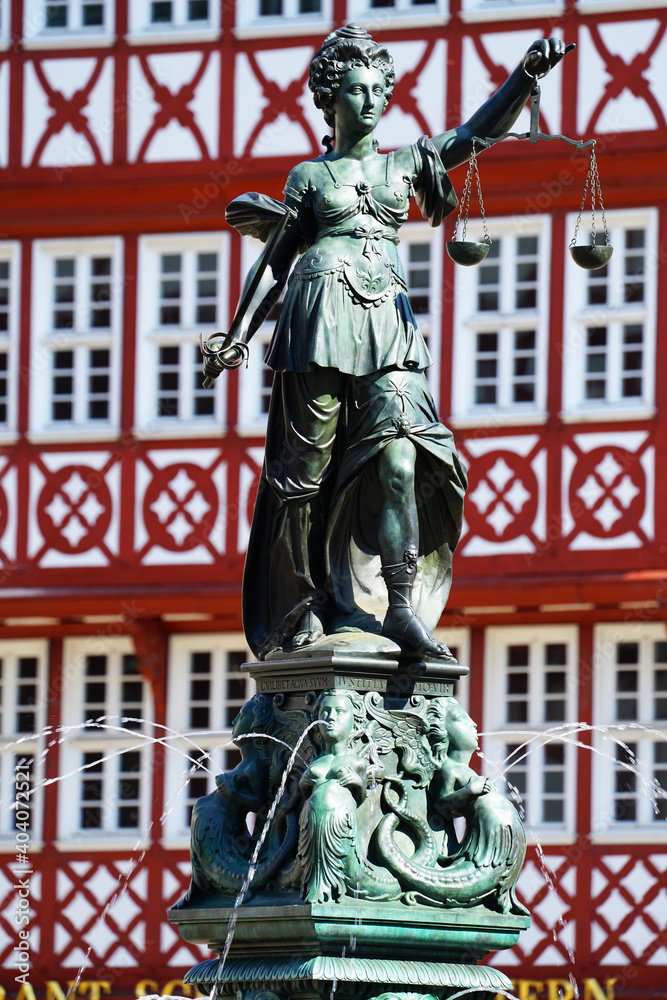 Fototapeta premium this monument is the most powerful sign of justice and power , behind the sculpture the beautiful old Frankfurt am Main 