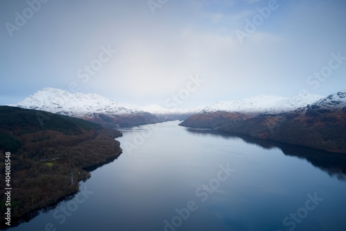 Mindfulness calm aerial view from above Loch Lomond at sunrise in Scotland
