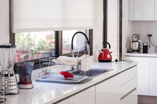 kitchen with white furniture and red artifact for architecture and decoration cordoba argentina