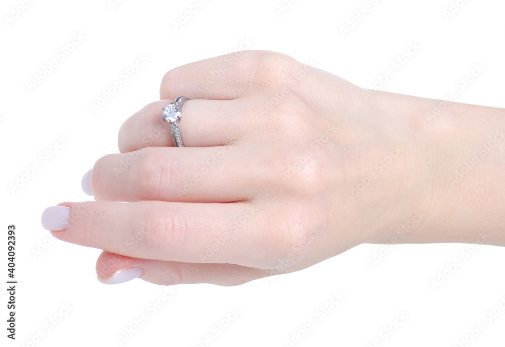 Female hand with silver ring of finger on white background isolation