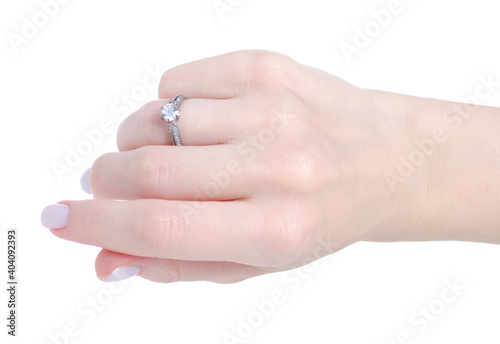 Female hand with silver ring of finger on white background isolation