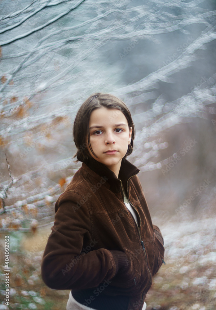 portrait of a long-haired boy with a soft focus portrait of a long-haired boy with a soft focus
