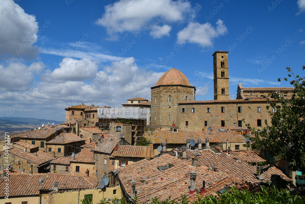 Scenic view of the old town in Tuscany with the Cathedral and the Baptistery of St John (13th century) in a sunny summer day