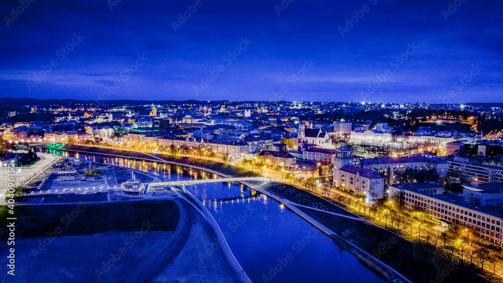Aerial view of night panorama in Vilnius by drone