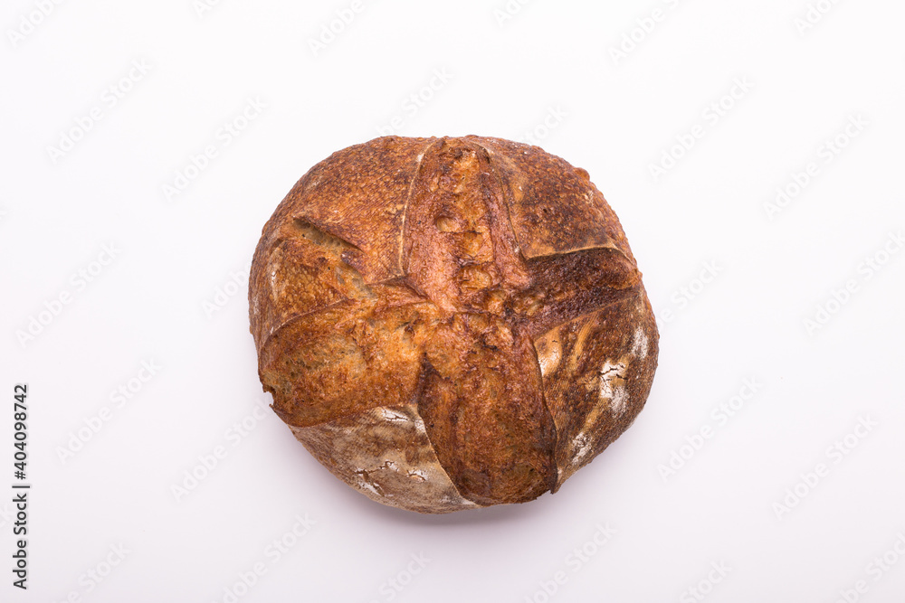 Fototapeta premium Round loaf of freshly backed sourdough bread