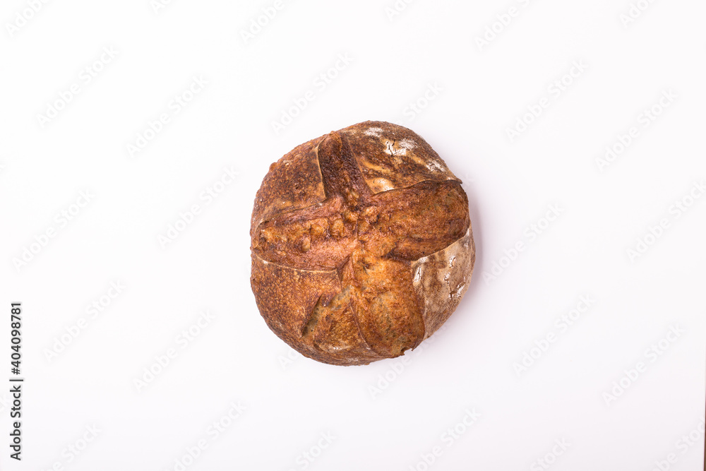 Round loaf of freshly backed sourdough bread Round loaf of freshly backed sourdough bread