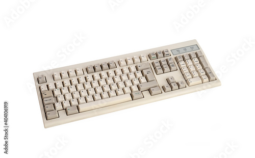 Cut Out Image Of An Old Computer Keyboard, Isolated On White Background