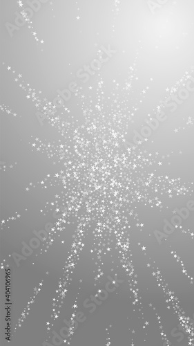 Amazing falling stars Christmas background. Subtle flying snow flakes and stars on grey background. Alive winter silver snowflake overlay template. Elegant vertical illustration.
