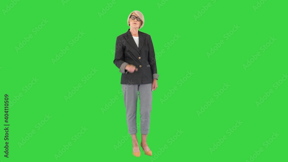 Don't do like that young man Serious-looking strict business lady on a Green Screen, Chroma Key. Don't do like that young man Serious-looking strict business lady on a Green Screen, Chroma Key.