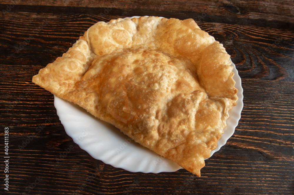 Traditional baked Argentine empanadas savory pastries with meat beef stuffing Traditional baked Argentine empanadas savory pastries with meat beef stuffing