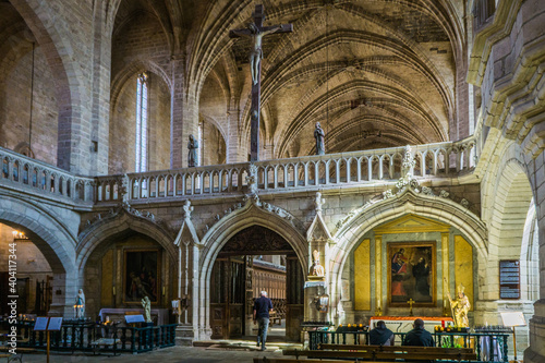 the rood screen inside the 14th century gothic abbey church of La Chaise Dieu in Auvergne, France