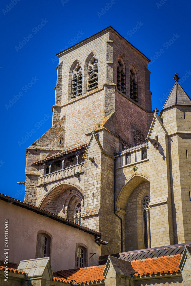 One of the two towers of the gothic abbey church of La Chaise Dieu, a 11th century abbey in Auvergne (France)