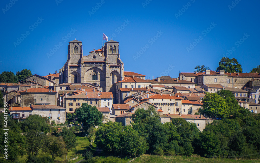 The small town of la Chaise Dieu in Auvergne, France. The imposing church is the abbey church of the 14th century