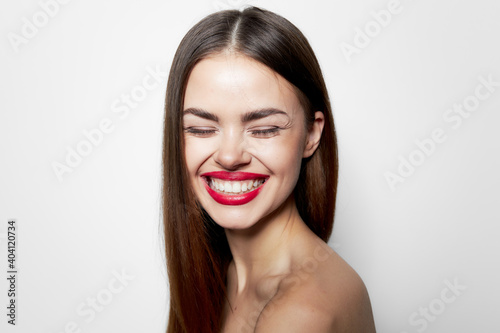 Woman portrait Wide smile closed eyes bare shoulders body care 