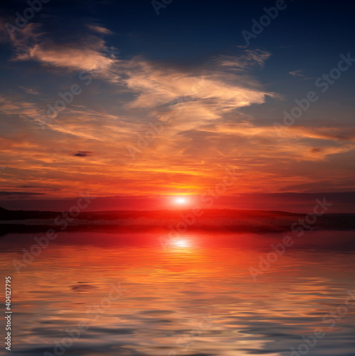 sunset over lake water surface
