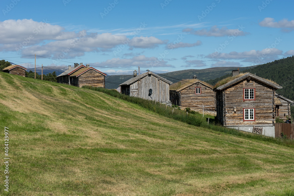 Mountain farm by the Åmotan waterfalls