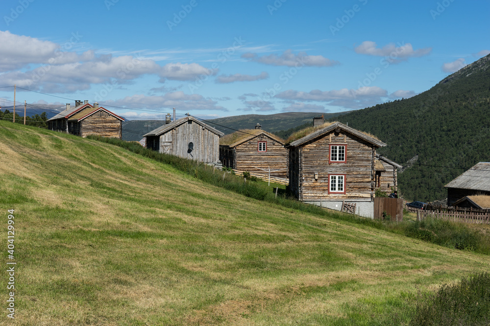 Mountain farm by the Åmotan waterfalls Mountain farm by the Åmotan waterfalls