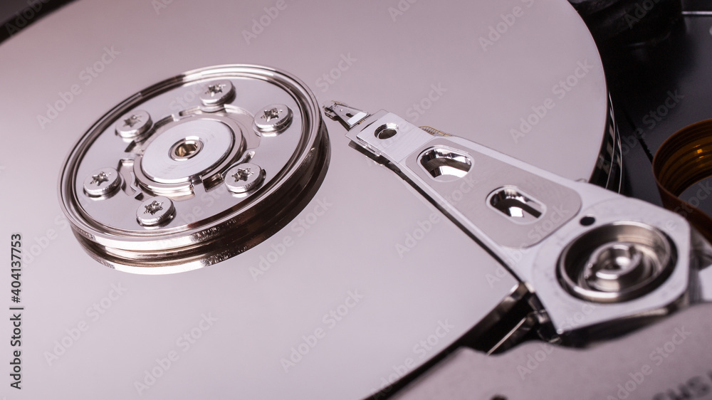 Macro view of spindle of the open hard disk drive Macro view of spindle of the open hard disk drive