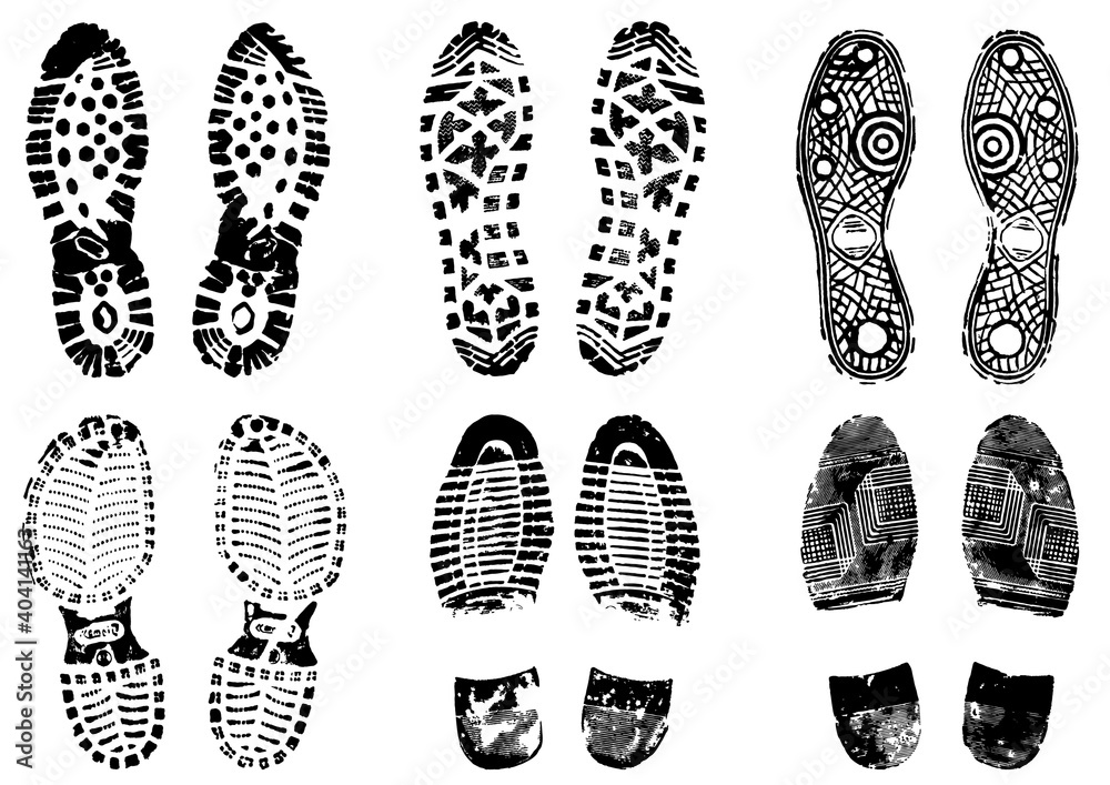 footprints stamped with black ink footprints stamped with black ink