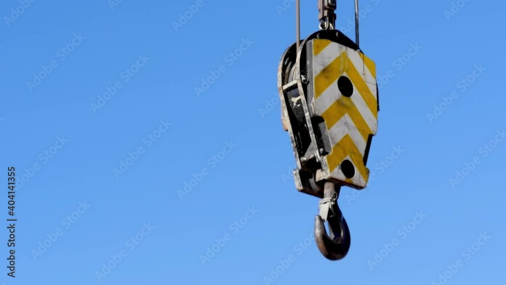 Crane driver handling equipment in construction site Crane driver handling equipment in construction site