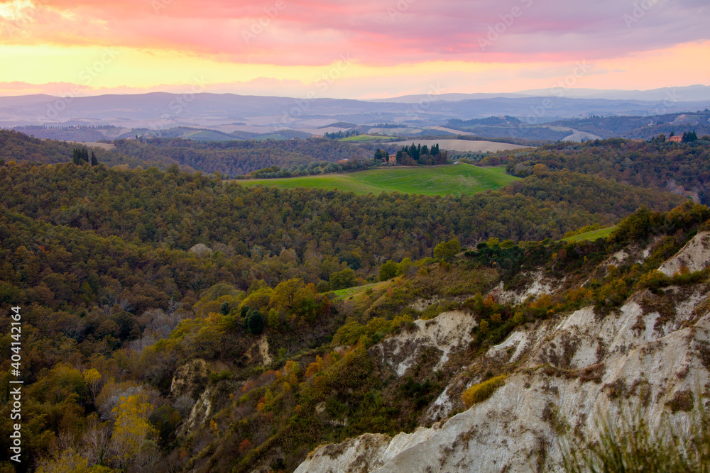 landscape with hills in Tuscany, Italy in autumn at sunset landscape with hills in Tuscany, Italy in autumn at sunset