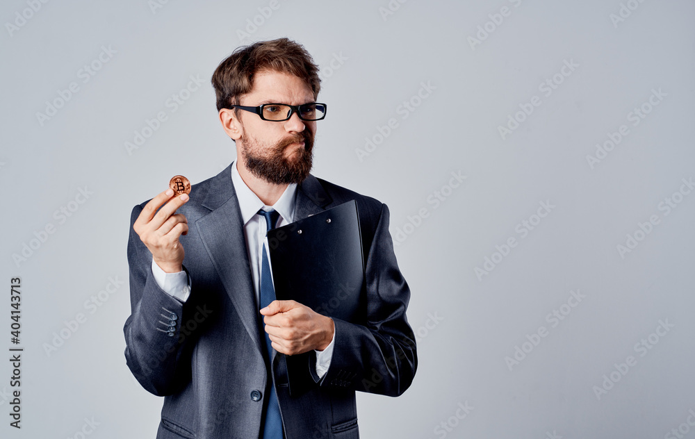 Men bitcoin currency exchange rate documents coin glasses business finance Men bitcoin currency exchange rate documents coin glasses business finance