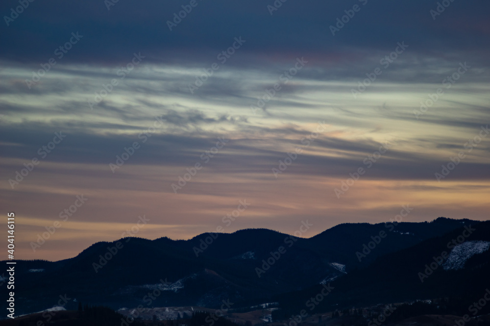 Forest silhouette on the background of sunset in the carpathians