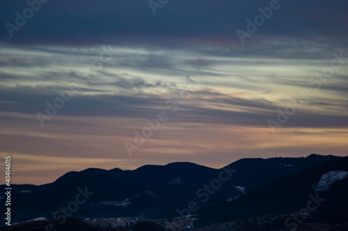 Forest silhouette on the background of sunset in the carpathians © onyx124