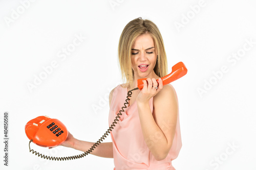 pretty woman with retro phone. modern and vintage technology. telephone conversation with friend. Cheerful woman talking on land line phone. connection and communication