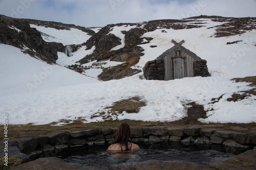 Winter panorama of Gudrunarlaug hot pot spring thermal bath natural swimming pool in Budarladur Dalabyggd Iceland photo