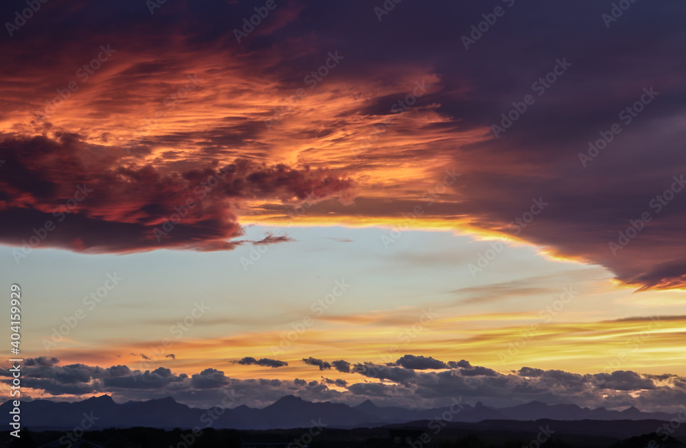 Dramatic Sunset with mountains in the distance