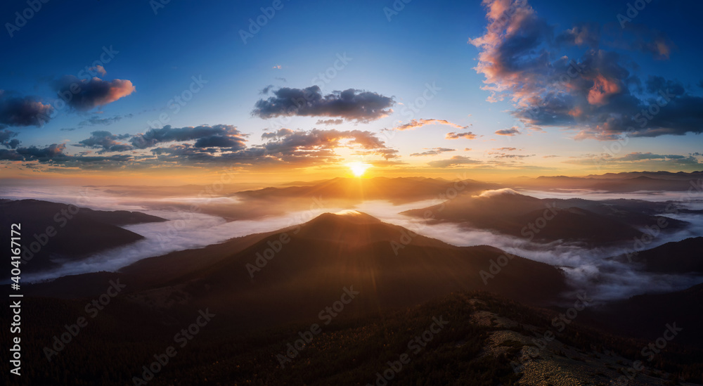 Dramatic morning landscape in the mountains with beautiful sky at sunrise.