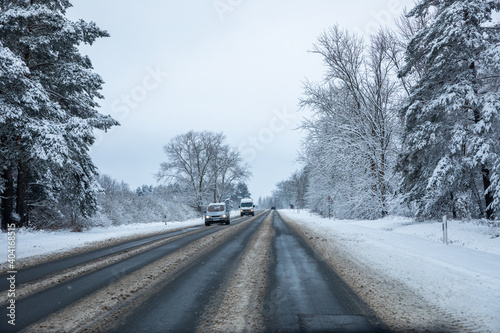 Country road after snowfall in Lithuania