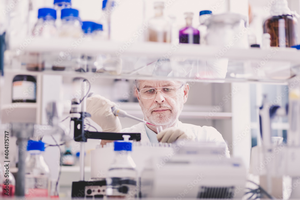 Life scientist researching in laboratory. Life sciences study living organisms on the level of microorganisms, viruses, human, animal and plant cells, genes, DNA... Life scientist researching in laboratory. Life sciences study living organisms on the level of microorganisms, viruses, human, animal and plant cells, genes, DNA...