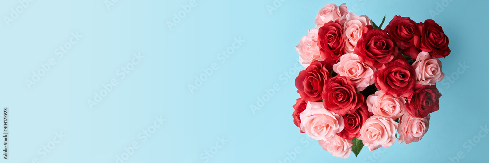 artificial red and pink roses in blue background to celebrate anniversary, happy valentine 's day or mother day wallpaper, flyers, invitation, posters, brochure, banners
artificial red and pink roses in blue background to celebrate anniversary, happy valentine 's day or mother day wallpaper, flyers, invitation, posters, brochure, banners