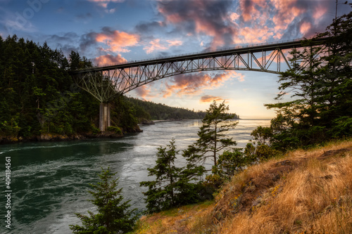 Iconic Bridge, Deception Pass, on the West Pacific Ocean Coast. Washington, United States. Colorful Sunset Sky Art Render. photo