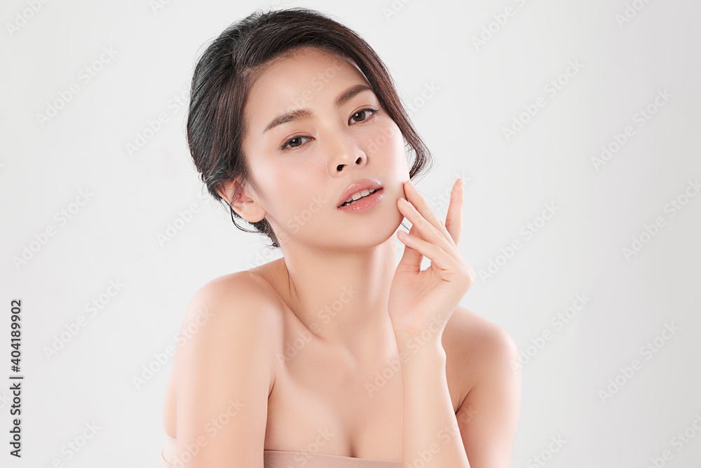 Beautiful Young asian Woman with Clean Fresh Skin, on Pink background, Face care, Facial treatment. Cosmetology, beauty and spa. Asian women portrait Beautiful Young asian Woman with Clean Fresh Skin, on Pink background, Face care, Facial treatment. Cosmetology, beauty and spa. Asian women portrait