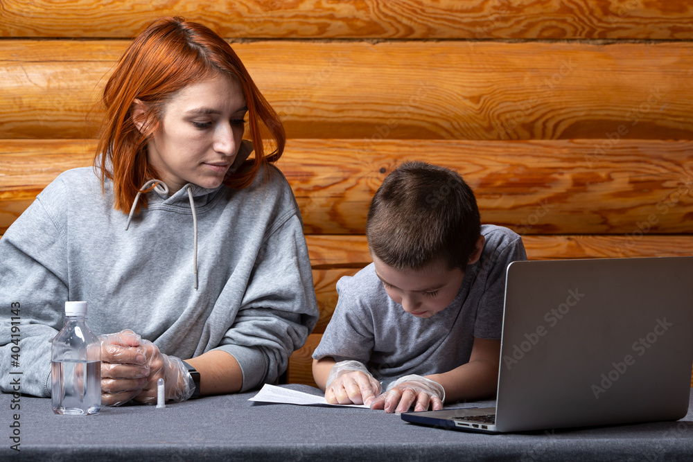 Chemistry education and study concept. Little boy reads instructions for laboratory work  . Chemical experiment with polymer worms