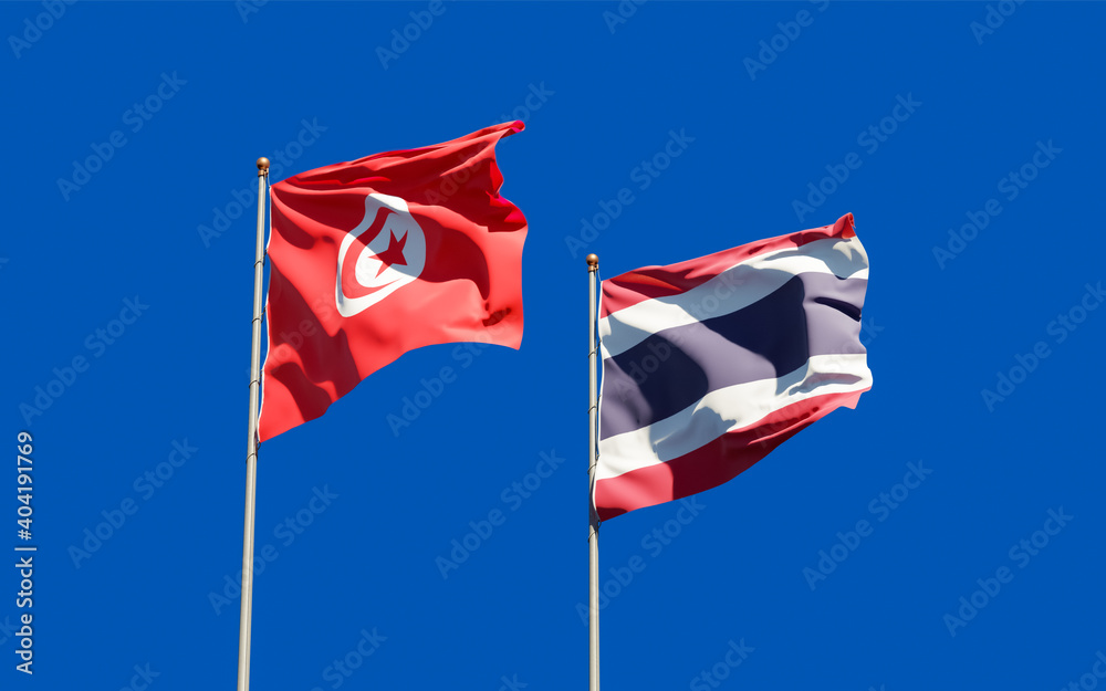 Flags of Tunisia and Thailand.