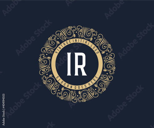 Initial IR Antique retro luxury victorian calligraphic emblem logo with ornamental frame.