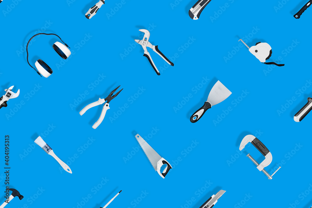 Tools seamless pattern. Various construction tools on a blue background. Tools seamless pattern. Various construction tools on a blue background.