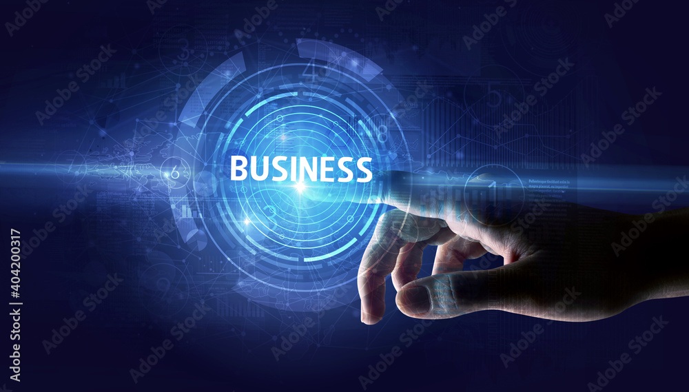 Hand touching BUSINESS button, modern business technology concept Hand touching BUSINESS button, modern business technology concept